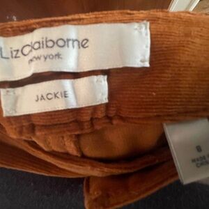 One long female corduroy pant.